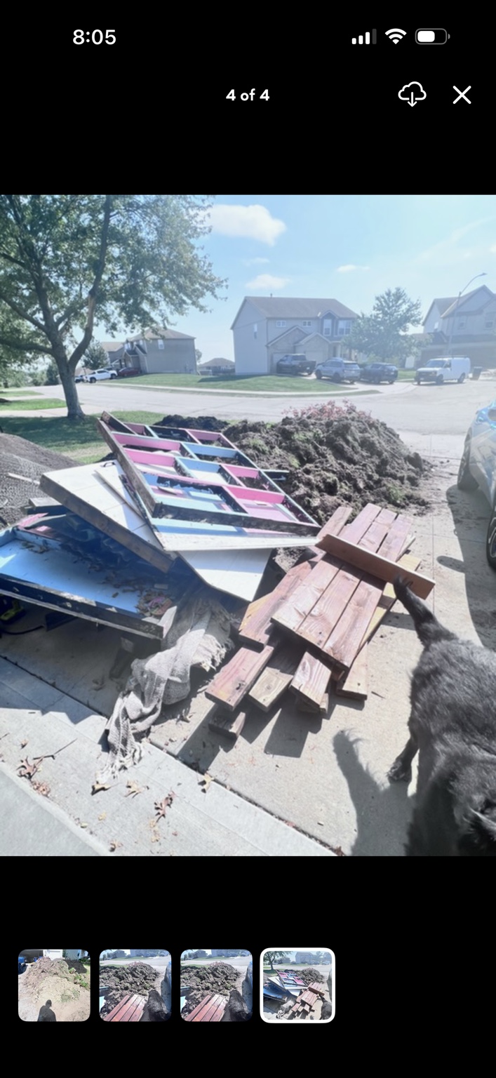 Construction debris cleanup in progress